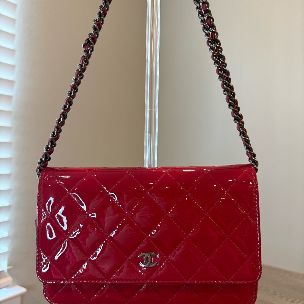 Authentic Chanel Wallet on Chain bag in vibrant red patent leather